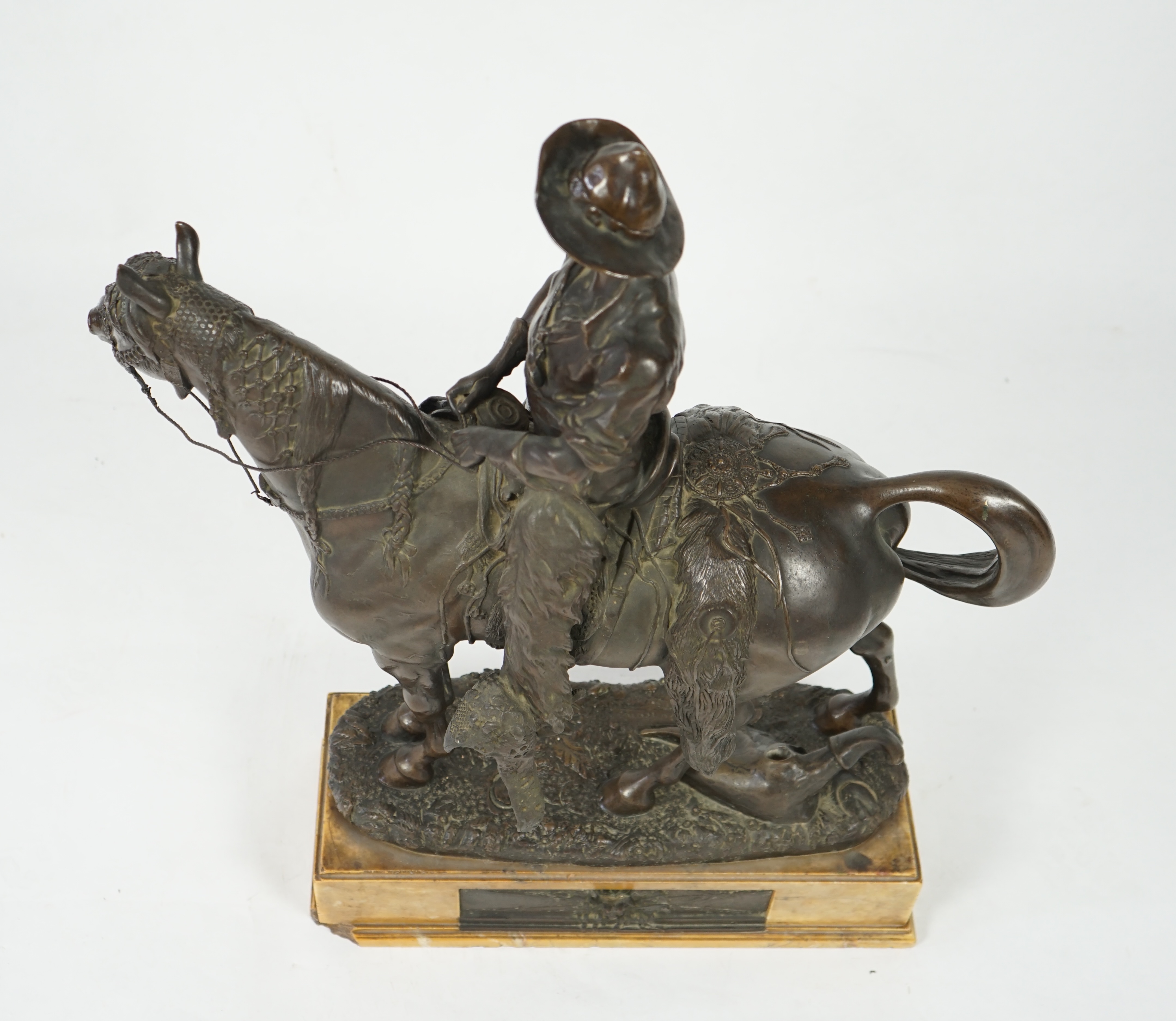 Walter Winans (St. Petersburg, 1852-Parsloe Park, Essex, 1920), a cast bronze of the artist, as a cowboy, riding the Arab stallion Skowronek, 50cm wide, 66cm high, overall 79.5cm high